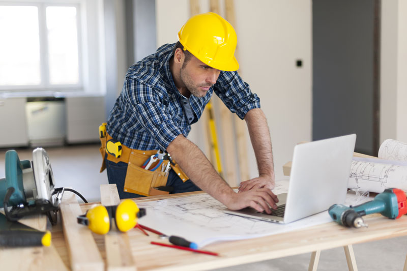  Civil Engineer working on blueprints 